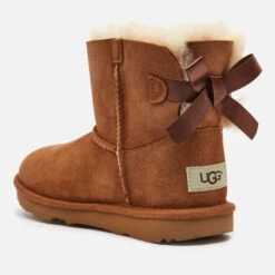 UGG Kids' Mini Bailey Bow Sheepskin Boots - Chestnut -Vans || Clarks || Ugg Sales 12614166 1844804157201091